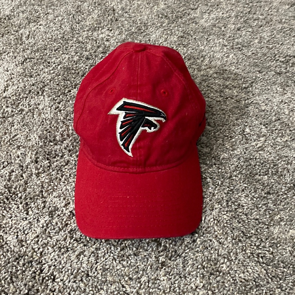 Atlanta Falcons New Era adjustable hat in red and black. Gently used.